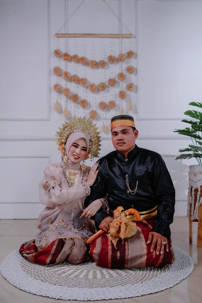 Erwandi & Yusrianti